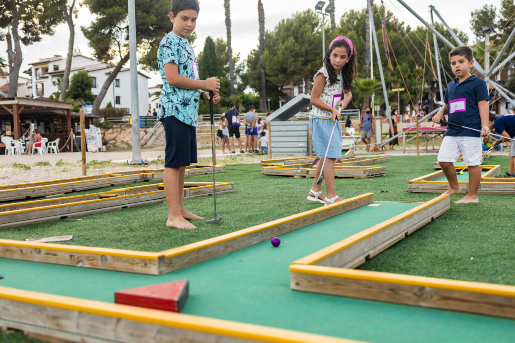 kids playing mini-golf